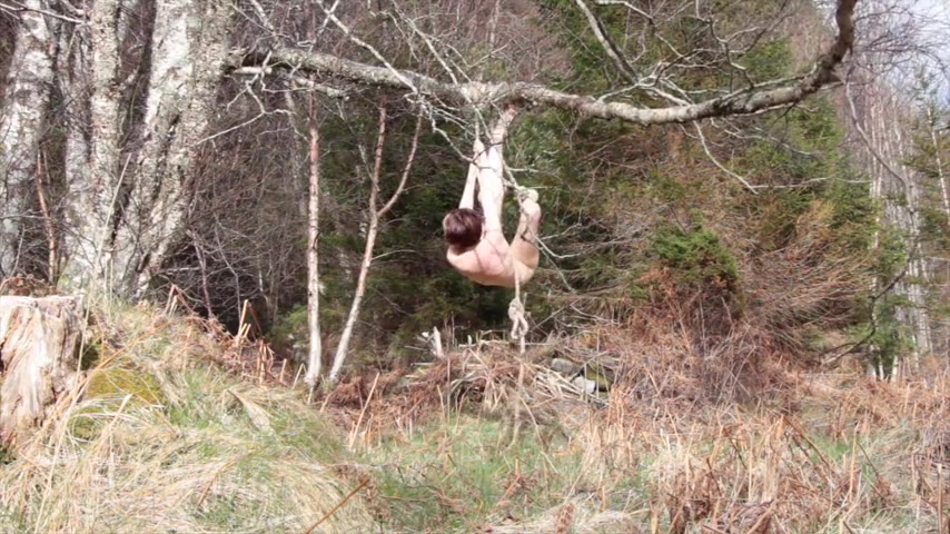 Naked self-bondage in the woods gone wrong.
